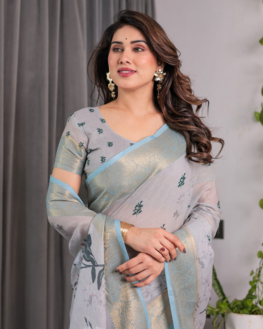 Ice Grey Handloom Linen Saree with Floral Print, Gold Zari Border & Tassel Detailing | Attached Blouse Piece | 5.5m Saree + 0.8m Blouse