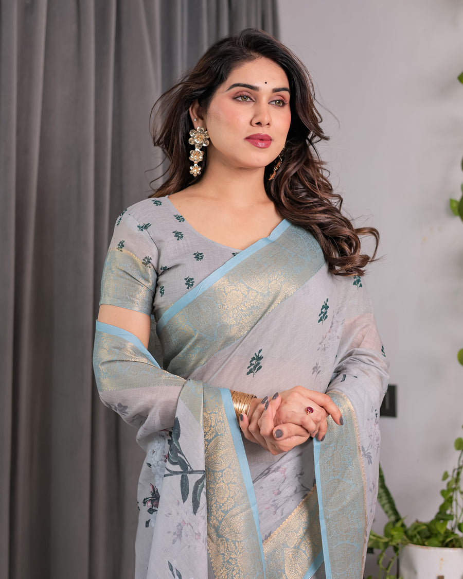 Ice Grey Handloom Linen Saree with Floral Print, Gold Zari Border & Tassel Detailing | Attached Blouse Piece | 5.5m Saree + 0.8m Blouse