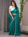 Emerald Green Fendy Satin Saree with Pearl Lace Border & Tassel Pallu | Premium Shimmer Satin Saree with Heavy Embroidered Designer Blouse | Zari Floral & Peacock Embroidery Blouse Festive Saree