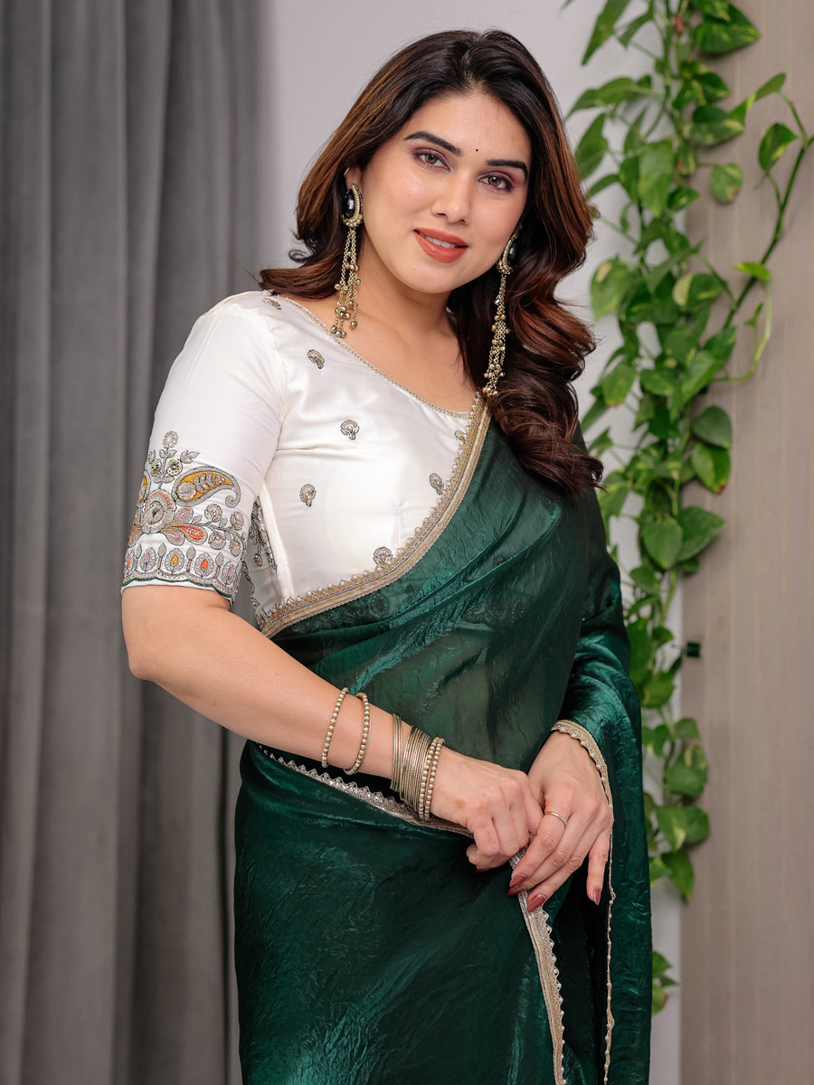 Emerald Bottle Green Fendy Satin Saree with Pearl Lace Border & Tassel Pallu | Premium Shimmer Satin Saree with Heavy Embroidered Designer Blouse | Zari Floral Paisley Embroidery Blouse Festive Saree