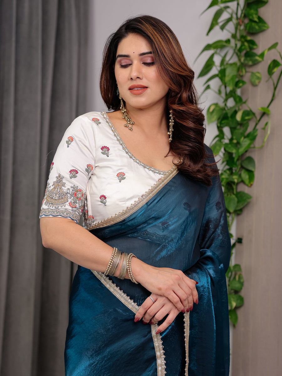 Deep Teal Fendy Satin Designer Saree with Pearl Lace Border & Tassel Pallu | Premium Shimmer Satin Saree with Heavy Floral Embroidered Ivory Blouse | Wedding & Festive Wear Saree