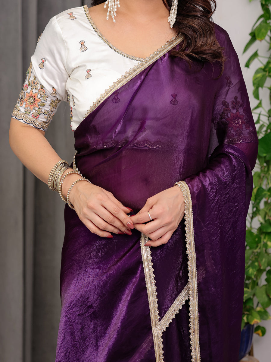 Royal Plum Purple Fendy Satin Designer Saree with Pearl Lace Border & Tassel Pallu | Premium Shimmer Satin Saree with Heavy Floral Embroidered Ivory Blouse | Wedding & Festive Wear Saree