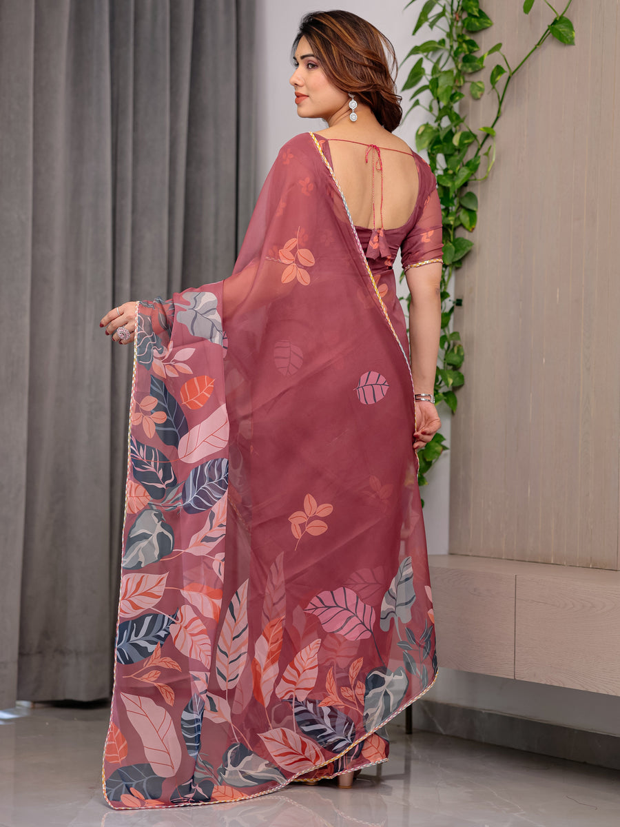 Rust Wine Printed Organza Saree with Tropical Leaf Border | Designer Lightweight Sheer Organza Saree with Botanical Prints & Attached Blouse Piece | Festive & Party Wear Saree