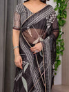 Black Floral Printed Organza Saree with Intricate Ethnic Border & Multicolour Lace Edges | Lightweight Designer Organza Saree with Attached Blouse Piece | Festive & Party Wear Saree