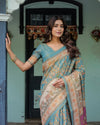 Turquoise Blue Handloom Cotton Saree with Multicolor Floral Pallu & Peach Border