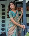 Teal Green Handloom Cotton Saree with Floral Print & Royal Bridal Procession Pallu