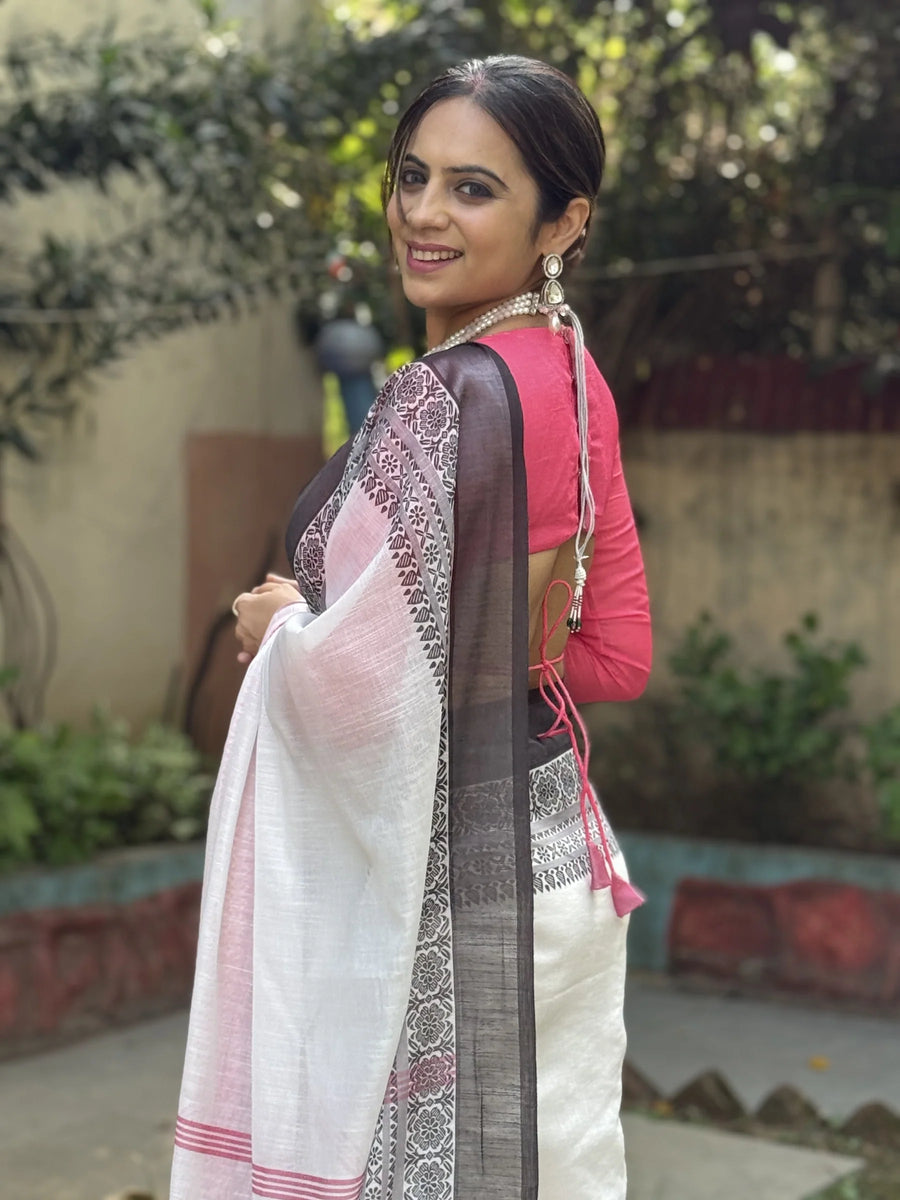 Elegant White Pure Linen Digital Printed Saree with Chevron Design and Intricate Red-Black Geometric Pallu – Tassel Details and Matching Blouse Piece