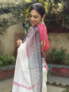 Elegant White Pure Linen Digital Printed Saree with Chevron Design and Intricate Red-Black Geometric Pallu – Tassel Details and Matching Blouse Piece