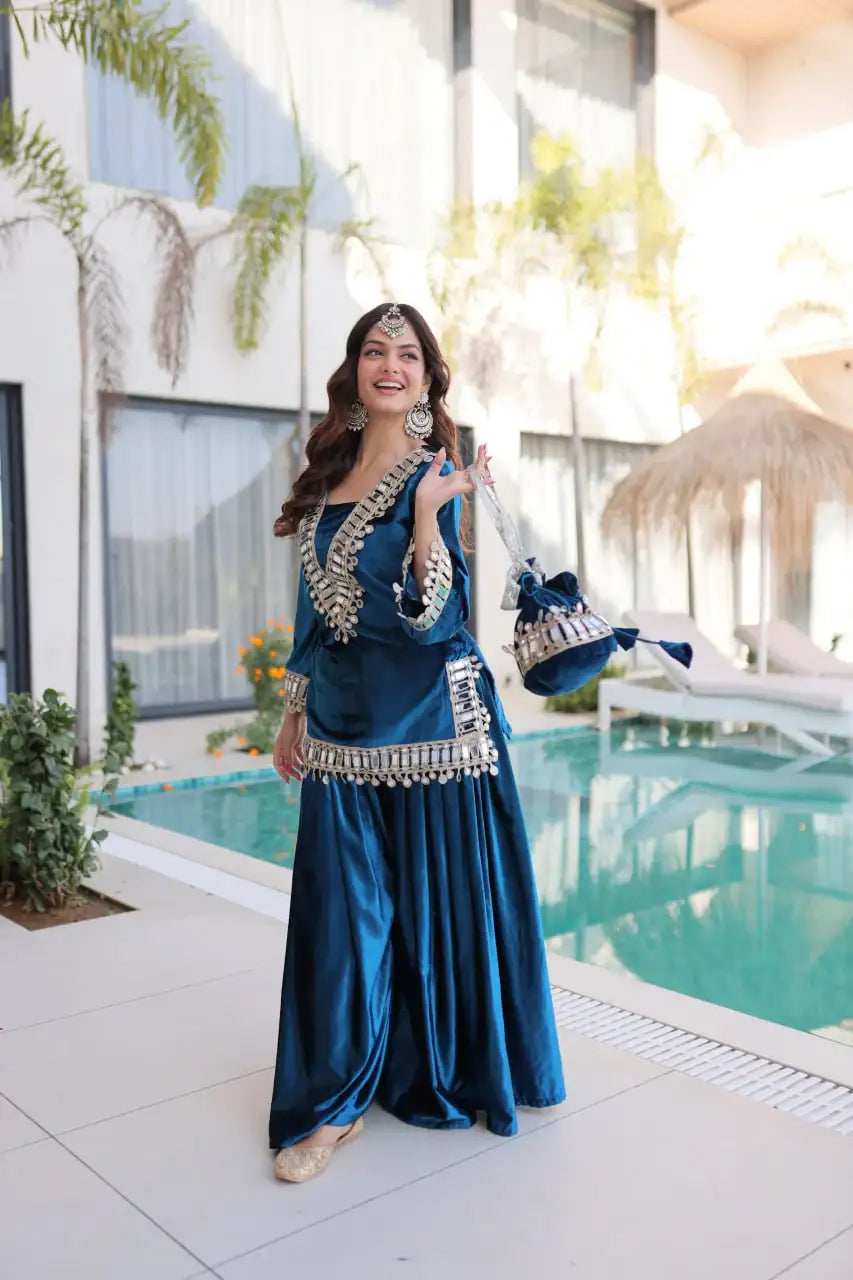 Close-up of teal blue ice velvet zari and mirror embroidery detail - Shree Roop