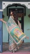 Teal Green Handloom Cotton Saree with Floral Print & Royal Bridal Procession Pallu