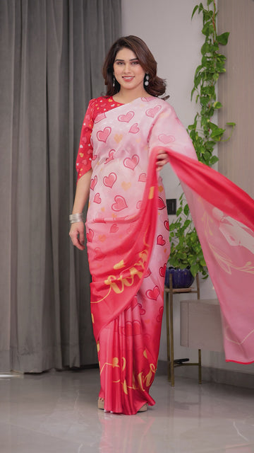 Coral Red & Blush Pink Heart Printed Satin Georgette Saree with Romantic Couple Pallu and Attached Heart Print Blouse – 5.5 Meter Designer Saree for Valentine’s Day & Anniversary Wear