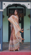 Burnt Peach Handloom Cotton Saree with Floral Buta Design & Village Scene Pallu