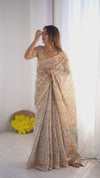 Handloom Linen Cotton Printed Saree with Mythical Animal Art Pallu – Soft Cream with Terracotta & Teal Accents